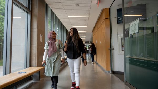 Students walking through Arts and Administration Building