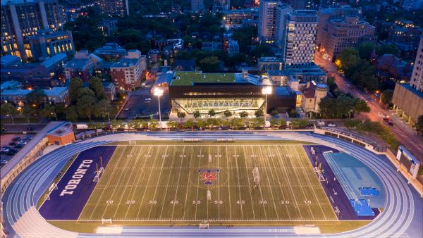 Varsity Stadium football field at night