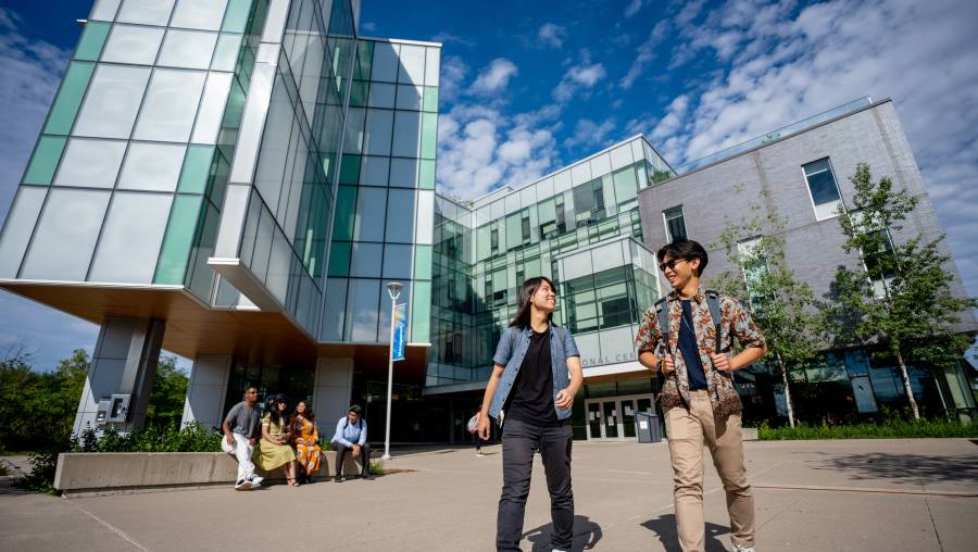 Students walking in front of UTSC's Instructional Centre
