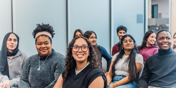 Students sitting in seminar room.
