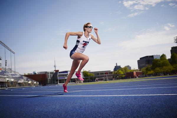 Sasha Gollish, long-distance runner, on a track.