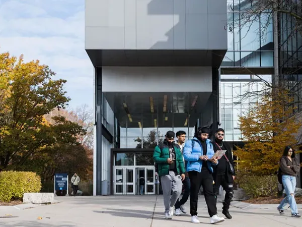 Students walking in front of CCT Building.