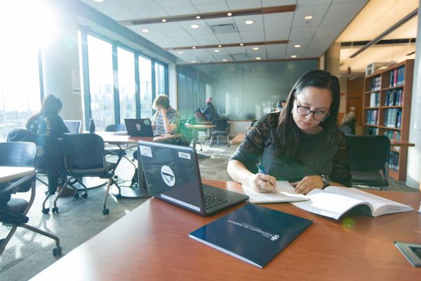 Student studying in UTM library.